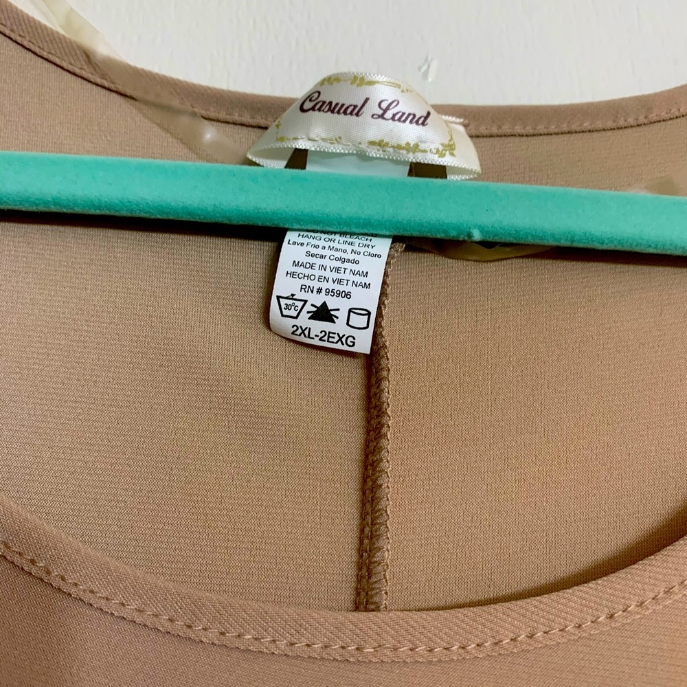 Nude boutique blouse